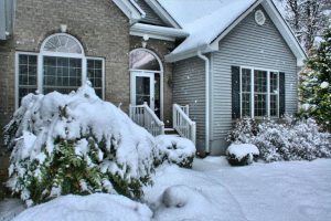 Home covered in snow in the winter